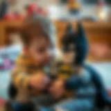 A child playing with a Batman-themed plush toy