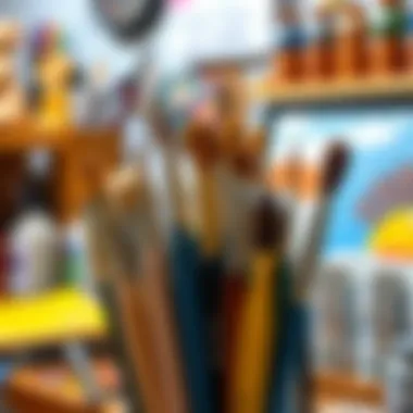 Close-up of brushes and paint tubes arranged neatly in a creative workspace